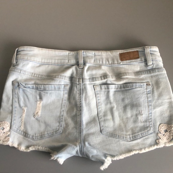 Ripped denim shorts - Picture 2 of 3